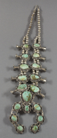 Navajo%20artist%2C%20%3Cb%3E%3Ci%3E%20Squash%20Blossom%20Necklace%20with%20Naja%3C%2Fi%3E%3C%2Fb%3E%2C%20ca.%201950%2C%20silver%20and%20turquoise%2C%20The%20Elizabeth%20Cole%20Butler%20Collection%2C%20no%20known%20copyright%20restrictions%2C%202012.92.104